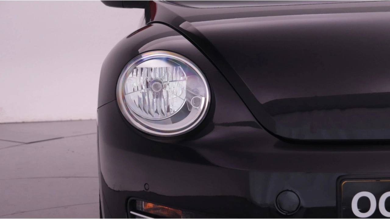 Volkswagen Beetle Cabriolet 1.2 TSI 105pk DSG Club Navigatie Leder